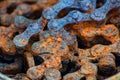 Old rusty industrial roller chain, soft focus Royalty Free Stock Photo