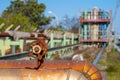 old and rusty industrial liquid control faucet.