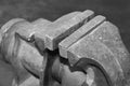 Old rusty iron bench vise on workbench close-up Royalty Free Stock Photo