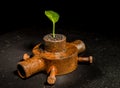 Old rusty iron bushing on a black background