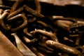 Old rusty iron chain in a pile Royalty Free Stock Photo