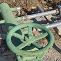 Old rusty iron water faucet for agriculture works Royalty Free Stock Photo