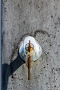 Old rusty key inside a keyhole Royalty Free Stock Photo