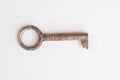 Old rusty key isolated on white background - Royalty Free Stock Photo