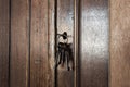 Old rusty keys inside a keyhole of an old antique closet. vintage design Royalty Free Stock Photo