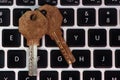 Old and rusty keys on laptop keyboard, computer security and password concept Royalty Free Stock Photo