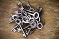 Old rusty keys on wooden background Royalty Free Stock Photo