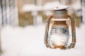 Old Rusty Lantern in the Snow Royalty Free Stock Photo