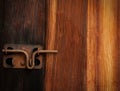 Old rusty latch on a farm shed door