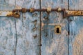 Old rusty latch on an old wood door