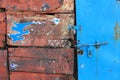 Old rusty latch on a wooden door Royalty Free Stock Photo
