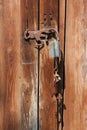 Old Rusty Latch on a Wooden Door Royalty Free Stock Photo