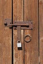 Old Rusty Latch on a Wooden Door Royalty Free Stock Photo