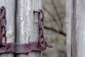 An old rusty lock on the remains of an ancient door Royalty Free Stock Photo