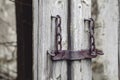 An old rusty lock on the remains of an ancient door Royalty Free Stock Photo