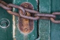old and rusty lock and thick chain Royalty Free Stock Photo