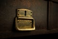 Old rusty lock in a wooden drawer