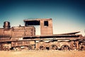 Old rusty locomotive abandoned in the train cemetery of Uyuni Bolivia