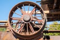 An old rusty machine belt wheel