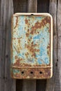 An old rusty mailbox on a wooden fence Royalty Free Stock Photo