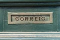 Old rusty mailbox with the word correio Royalty Free Stock Photo