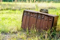 Old rusty mailboxes in rural area on a green background Royalty Free Stock Photo