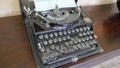 Old rusty mechanical type writer in action