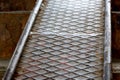 Old rusty metal aluminum steel ramp for bicycle footbridges