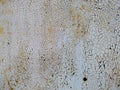 Old rusty metal background, dirty rough surface, peeled cracked blue paint, material exposed to atmospheric influences Royalty Free Stock Photo