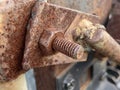 Old rusty metal bolt on the background of the house Royalty Free Stock Photo