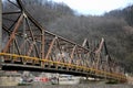 Old rusty metal bridge with yellow pipe Bosnia Hercegovina