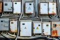 Old rusty metal electrical boxes with wires on the wall Royalty Free Stock Photo