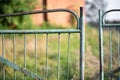 old rusty metal gate with cracked paint