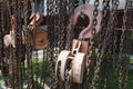 Old rusty metal hoist chain and pulley Royalty Free Stock Photo