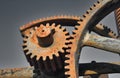 Old rusty metal industrial gears or cogs used in machinery Royalty Free Stock Photo