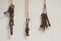 Old rusty metal keys hanging on rope Royalty Free Stock Photo