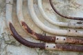 Old rusty metal pipe on cement wall Royalty Free Stock Photo