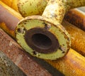 Old rusty metal pipe connection. Scrap metal - predominantly ferrous metals. Waste from industry Royalty Free Stock Photo