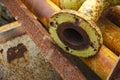 Old rusty metal pipe connection. Scrap metal - predominantly ferrous metals. Waste from industry Royalty Free Stock Photo