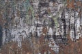 Old rusty metal plate with black and white ragged paint and scratches. rough surface texture Royalty Free Stock Photo