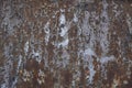 Old rusty metal plate with white peeled paint and scratches. rough surface texture Royalty Free Stock Photo