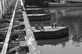 Old rusty metal pontoon bridge over the river Royalty Free Stock Photo