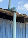 Old rusty metal roof with a blue sky Royalty Free Stock Photo