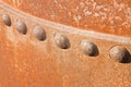 Old rusty metal tank with rivets Royalty Free Stock Photo