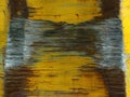Old rusty metal texture painted with yellow pain Royalty Free Stock Photo