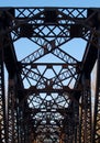 Old Metal Truss narrow bridge with blue sky Royalty Free Stock Photo