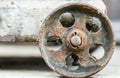 Old rusty metal wheel closeup detail background Royalty Free Stock Photo