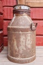 Old rusty milk churn outdoors