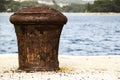 Old and rusty mooring post