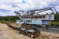 Old rusty multi bucket excavator, giant stacker, absetzer in sandy career